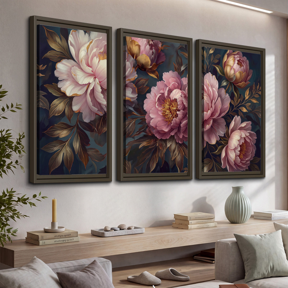 Large pink and cream peonies against deep blue foliage 3 piece framed canvas wall art displayed in a console