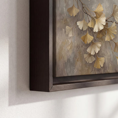 Cream and gold-colored ginkgo leaves against warm gray 3 piece framed canvas wall art material and edge close up