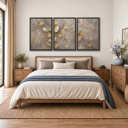 Cream and gold-colored ginkgo leaves against warm gray 3 piece framed canvas wall art styled in an interior