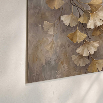 Cream and gold-colored ginkgo leaves against warm gray set of 3 poster prints material and edge close up