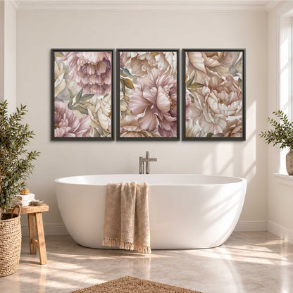 Layered soft pink and ivory flowers with sage leaves 3 piece framed canvas wall art styled in an interior