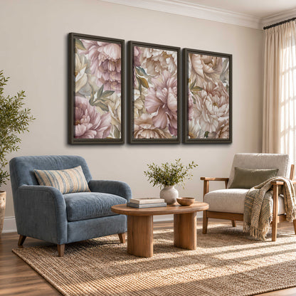 Layered soft pink and ivory flowers with sage leaves 3 piece framed canvas wall art styled in an interior