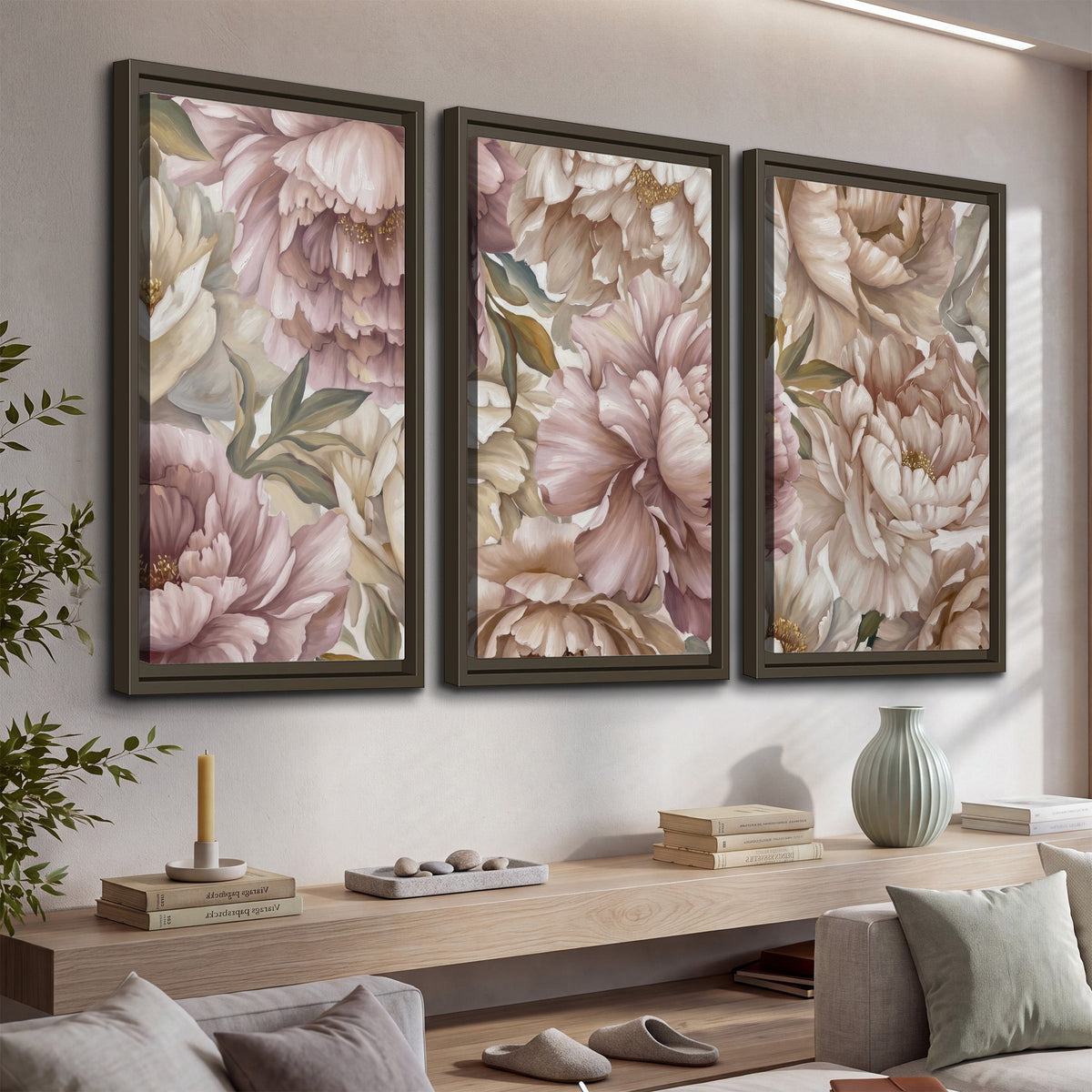 Layered soft pink and ivory flowers with sage leaves 3 piece framed canvas wall art displayed in a console