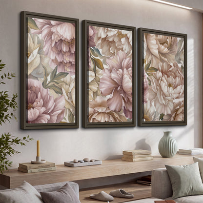 Layered soft pink and ivory flowers with sage leaves 3 piece framed canvas wall art displayed in a console