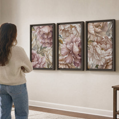Layered soft pink and ivory flowers with sage leaves 3 piece framed canvas wall art three panel arrangement on a wall