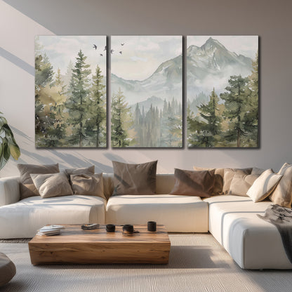 Soft green mountain peaks and evergreen trees beneath birds 3 piece canvas wall art displayed in a living room