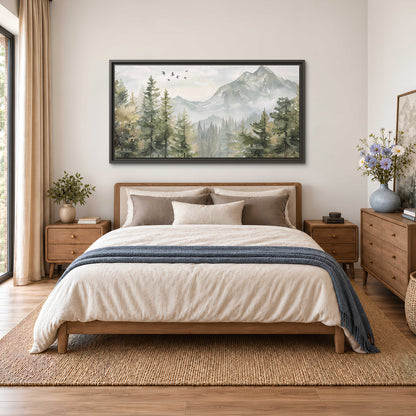 Soft green mountain peaks and evergreen trees beneath birds single framed canvas wall art styled in an interior