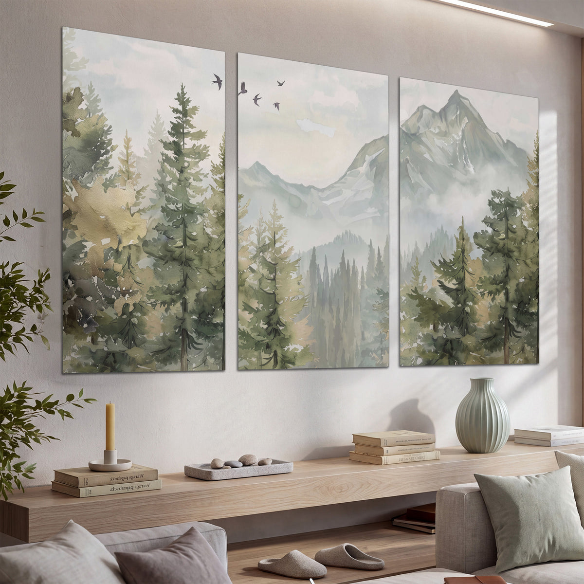 Soft green mountain peaks and evergreen trees beneath birds set of 3 poster prints displayed in a console