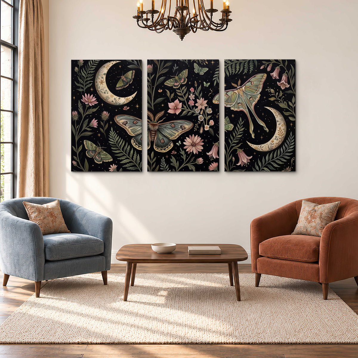 Decorative moths, crescent moons and flowers on black 3 piece canvas wall art styled in an interior