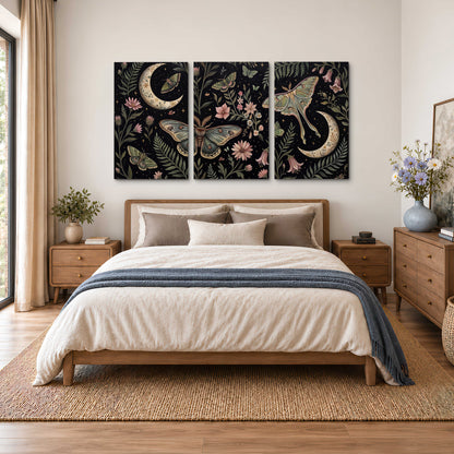 Decorative moths, crescent moons and flowers on black 3 piece canvas wall art styled in an interior