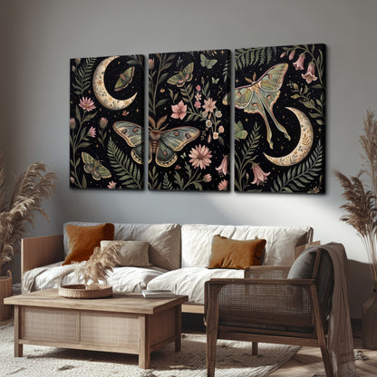Decorative moths, crescent moons and flowers on black 3 piece canvas wall art displayed in a rustic living room