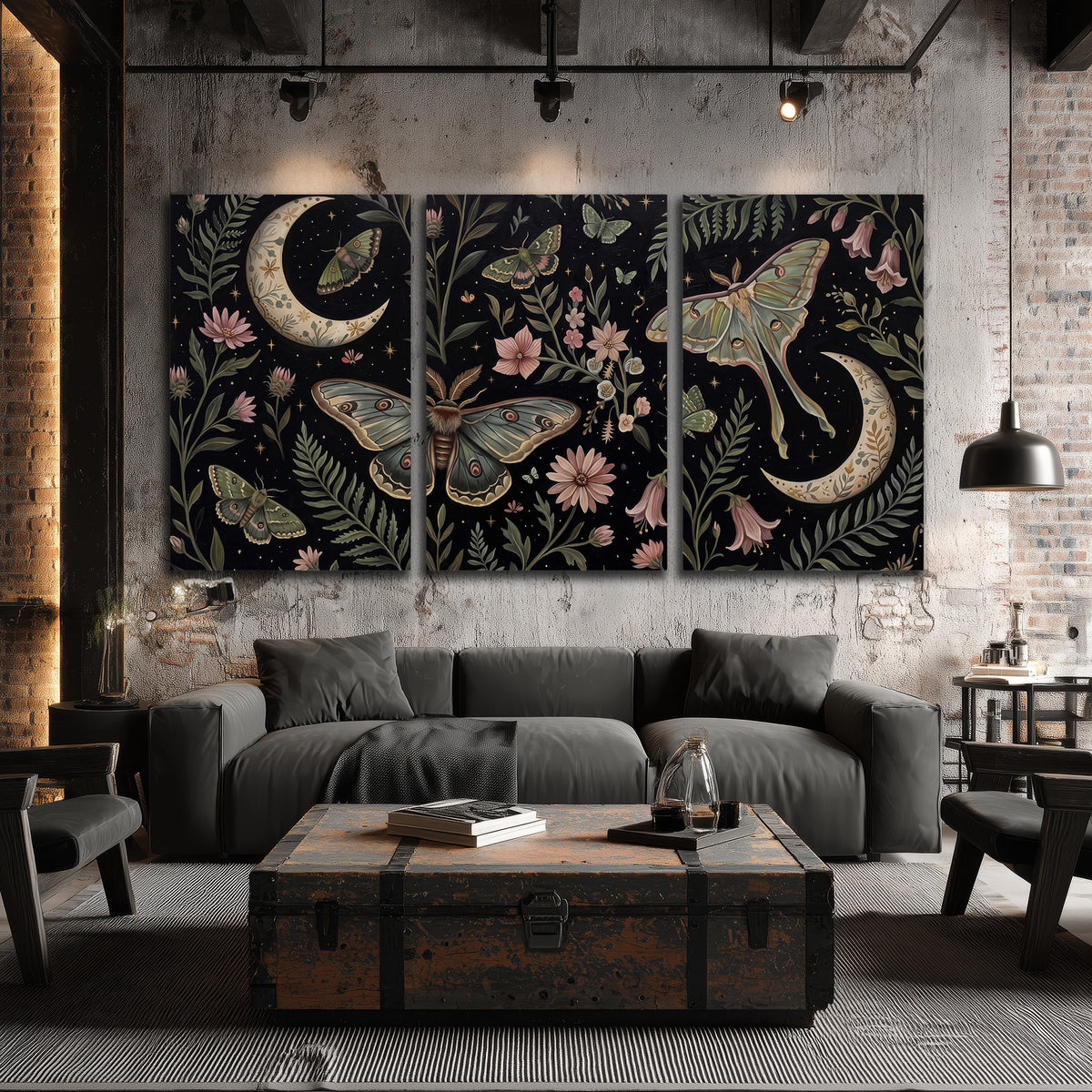 Decorative moths, crescent moons and flowers on black 3 piece canvas wall art displayed in a industrial room