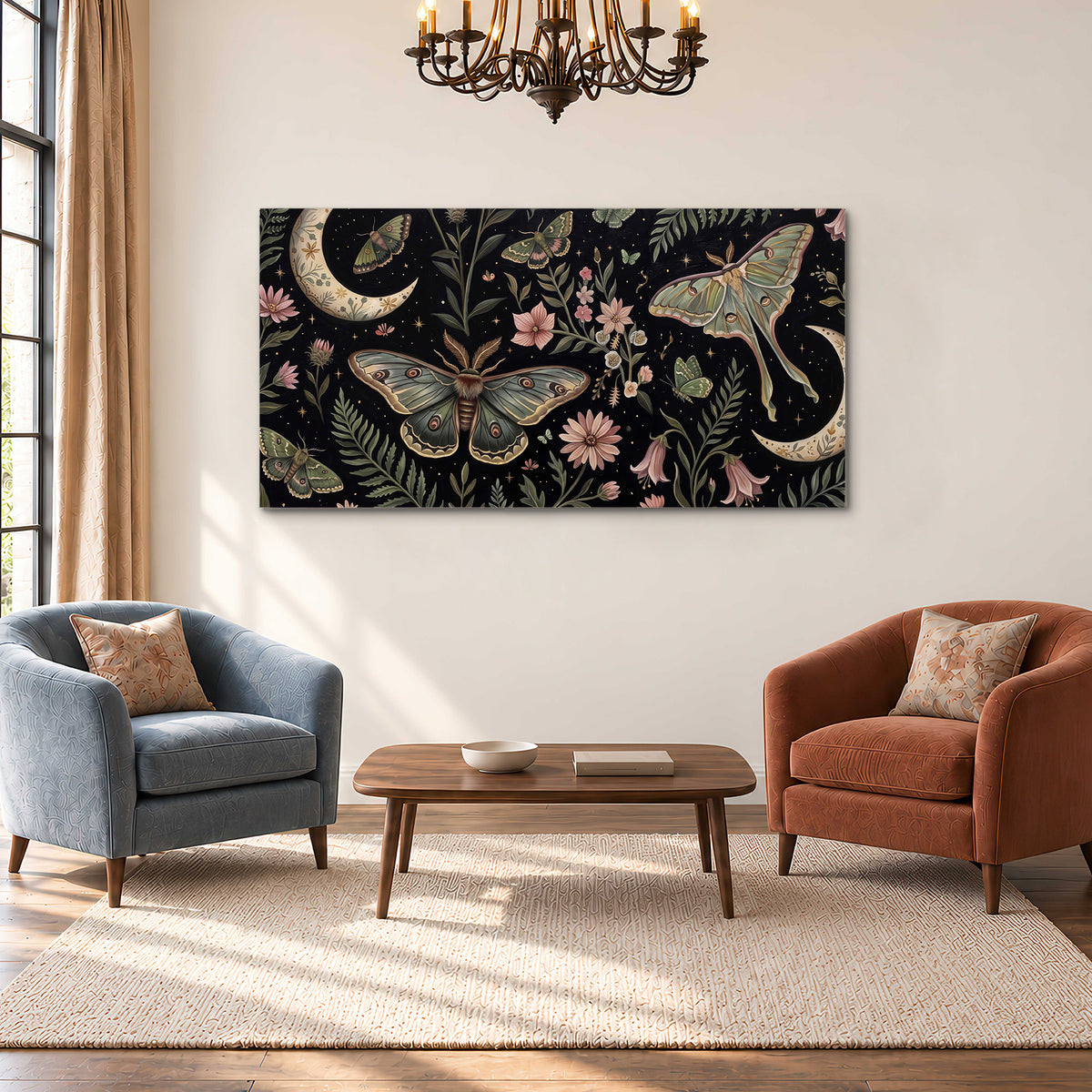 Decorative moths, crescent moons and flowers on black single canvas wall art styled in an interior