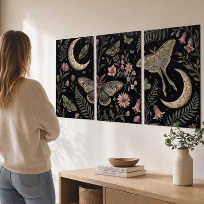 Decorative moths, crescent moons and flowers on black set of 3 poster prints three panel arrangement on a wall
