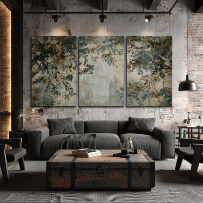Overhanging branches framing a misty woodland clearing 3 piece canvas wall art displayed in a industrial room