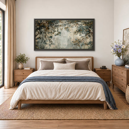 Overhanging branches framing a misty woodland clearing single framed canvas wall art styled in an interior