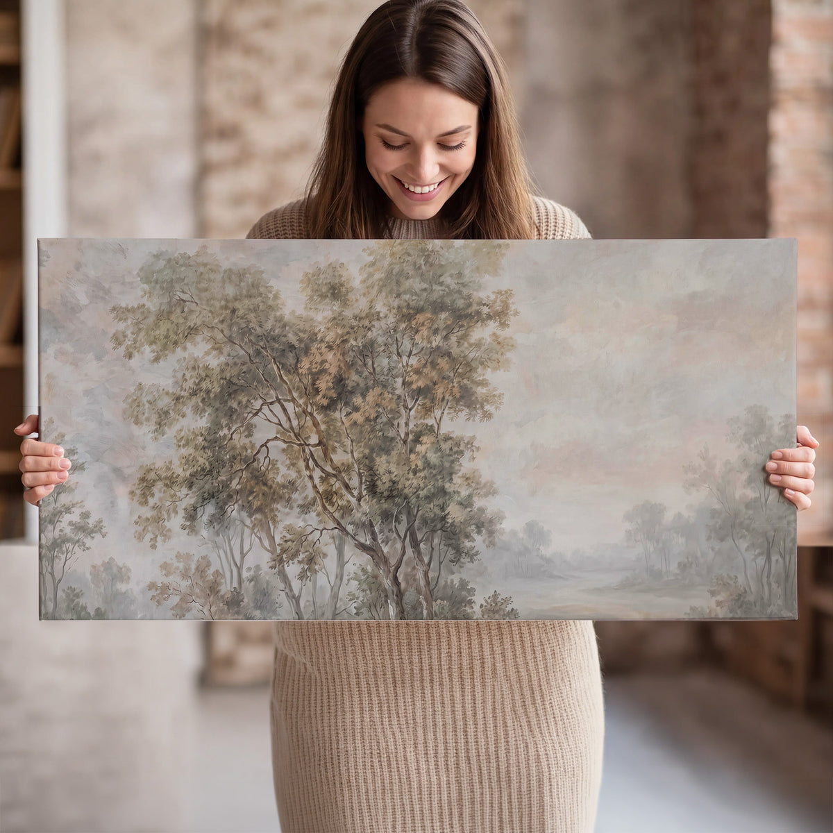 Delicate golden foliage and a hazy pastel countryside single canvas wall art held in hands