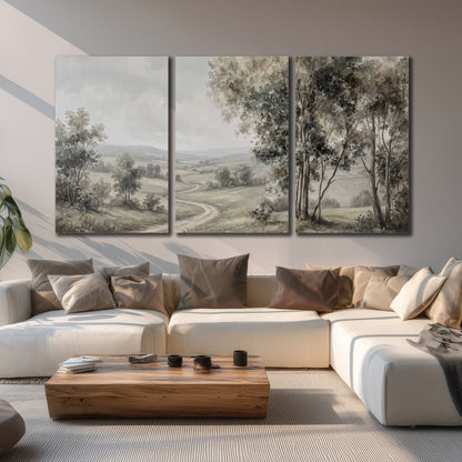A quiet winding road through gray-green rolling hills 3 piece canvas wall art displayed in a living room