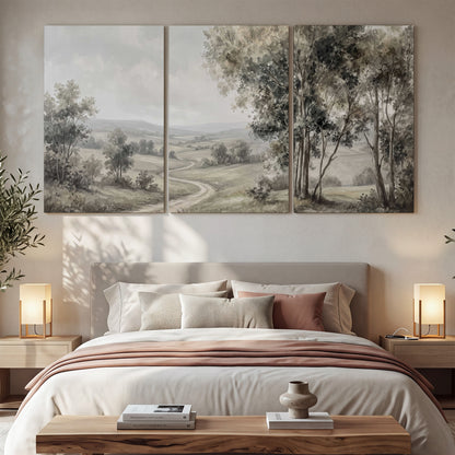 A quiet winding road through gray-green rolling hills 3 piece canvas wall art displayed in a bedroom