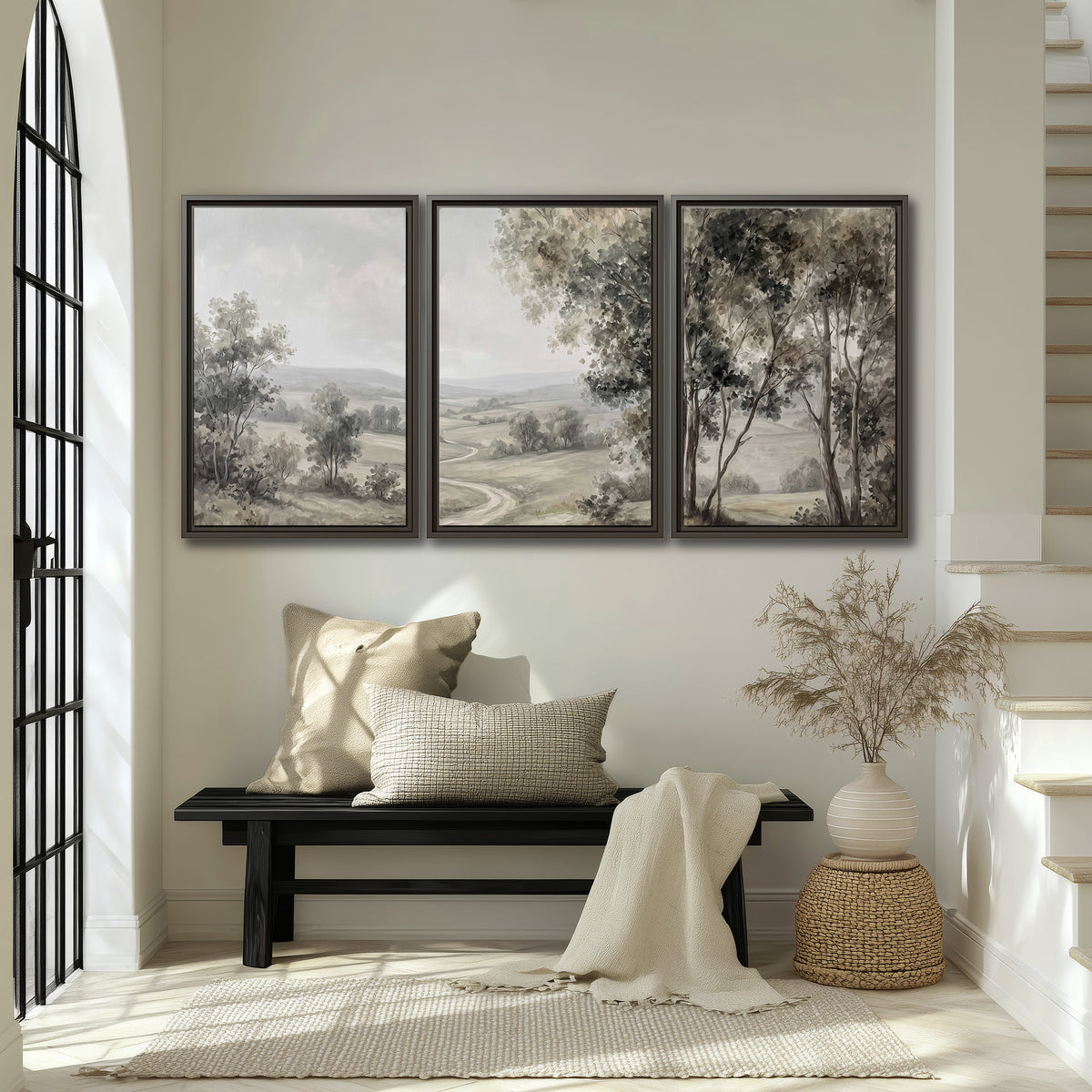 A quiet winding road through gray-green rolling hills 3 piece framed canvas wall art displayed in a entryway