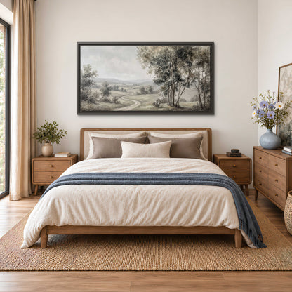 A quiet winding road through gray-green rolling hills single framed canvas wall art styled in an interior