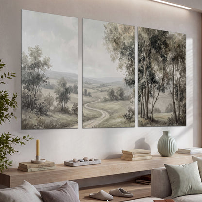 A quiet winding road through gray-green rolling hills set of 3 poster prints displayed in a console