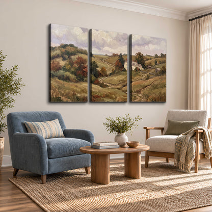 Warm rolling fields and countryside cottages beneath soft clouds 3 piece canvas wall art styled in an interior