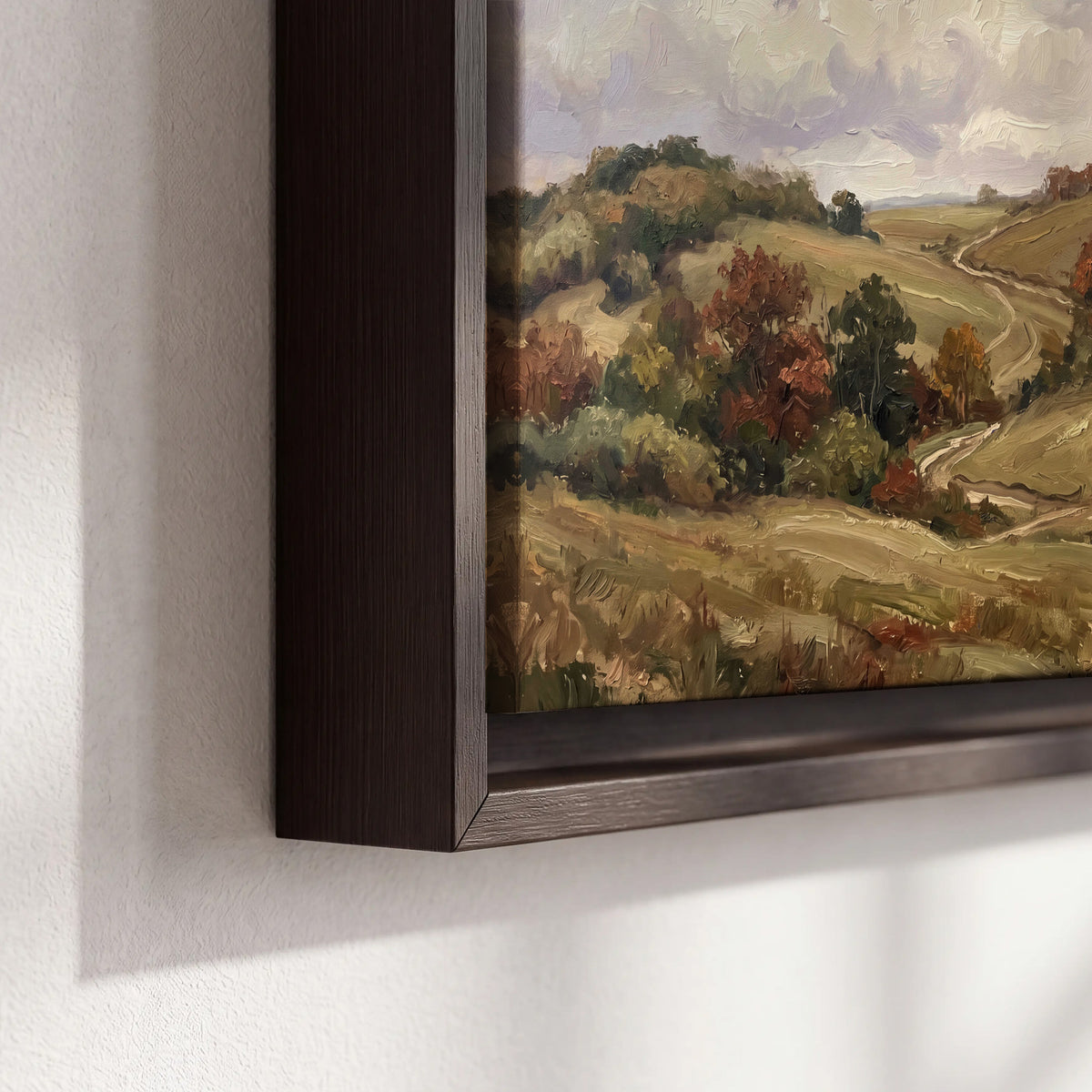 Warm rolling fields and countryside cottages beneath soft clouds 3 piece framed canvas wall art material and edge close up