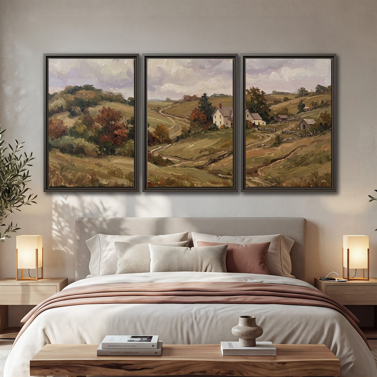 Warm rolling fields and countryside cottages beneath soft clouds 3 piece framed canvas wall art displayed in a bedroom