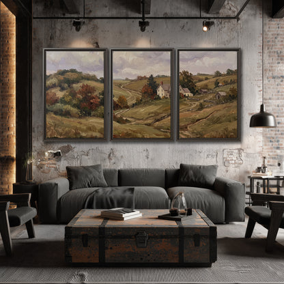 Warm rolling fields and countryside cottages beneath soft clouds 3 piece framed canvas wall art displayed in a industrial room
