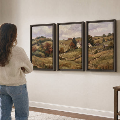 Warm rolling fields and countryside cottages beneath soft clouds 3 piece framed canvas wall art three panel arrangement on a wall