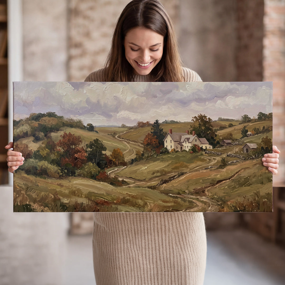 Warm rolling fields and countryside cottages beneath soft clouds single canvas wall art held in hands