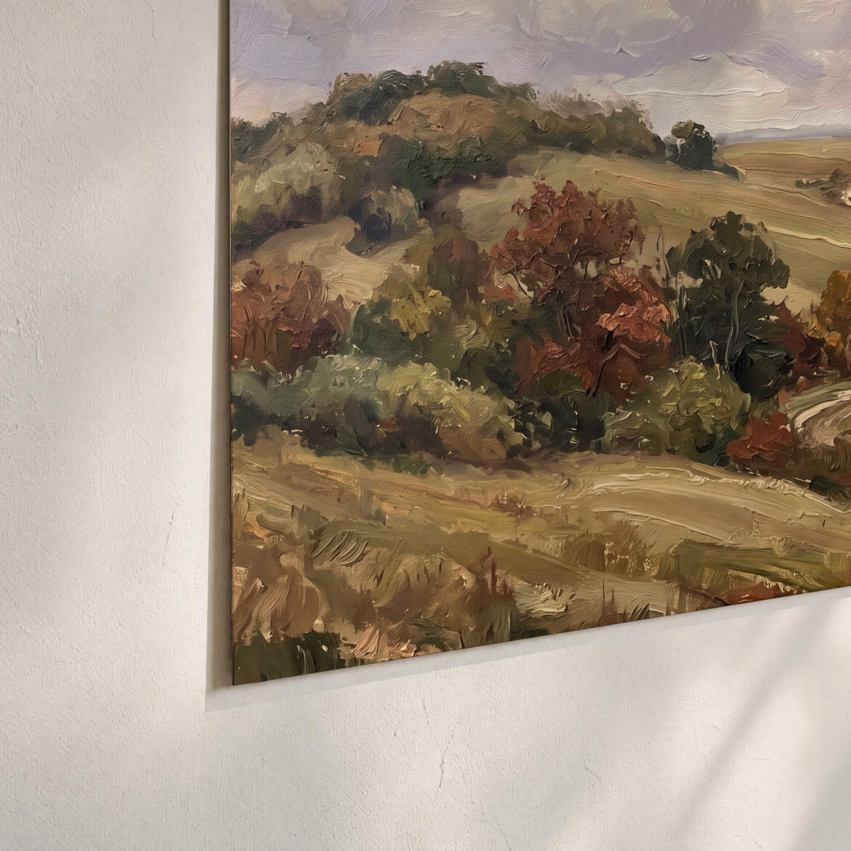 Warm rolling fields and countryside cottages beneath soft clouds set of 3 poster prints material and edge close up