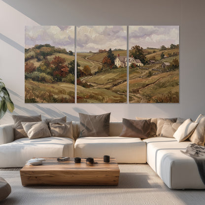 Warm rolling fields and countryside cottages beneath soft clouds set of 3 poster prints displayed in a living room
