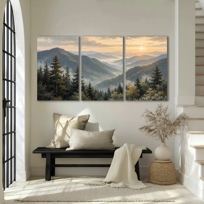 Blue-green mountain ridges and pines beneath a golden sunset 3 piece canvas wall art displayed in a entryway