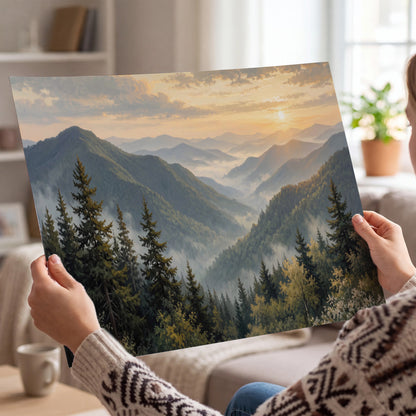 Blue-green mountain ridges and pines beneath a golden sunset single poster print held in hands