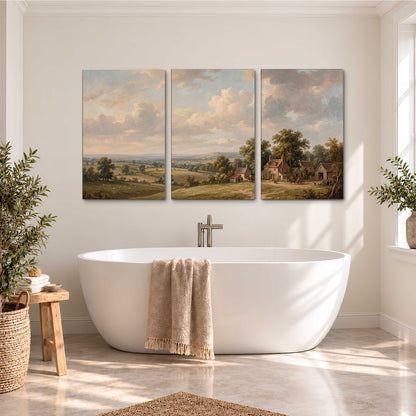 Small cottages overlooking fields beneath a luminous cloudy sky 3 piece canvas wall art styled in an interior