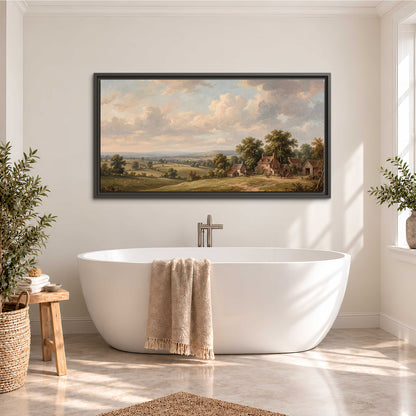 Small cottages overlooking fields beneath a luminous cloudy sky single framed canvas wall art styled in an interior