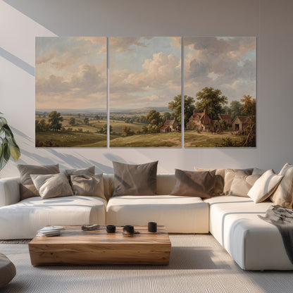 Small cottages overlooking fields beneath a luminous cloudy sky set of 3 poster prints displayed in a living room