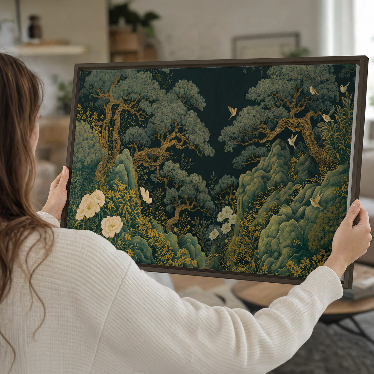 Decorative green trees, rocks, flowers and small birds single framed canvas wall art held in hands