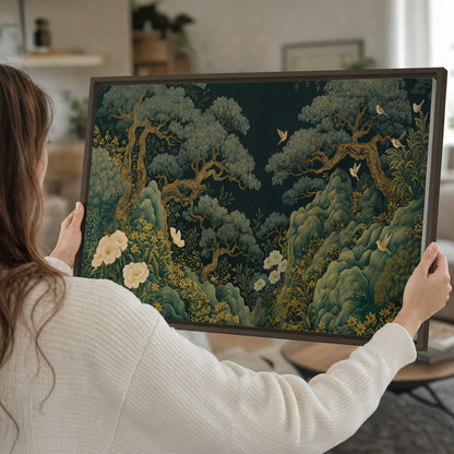 Decorative green trees, rocks, flowers and small birds single framed canvas wall art held in hands