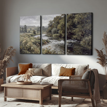 A gently flowing river bordered by olive-green trees and flowers 3 piece canvas wall art displayed in a rustic living room