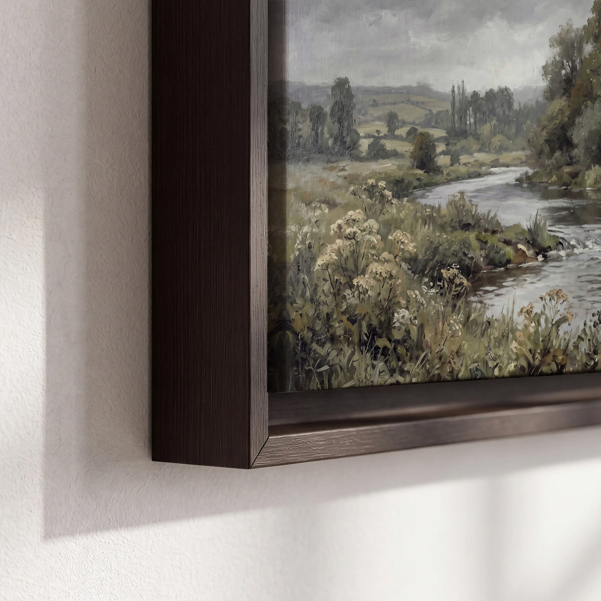 A gently flowing river bordered by olive-green trees and flowers 3 piece framed canvas wall art material and edge close up