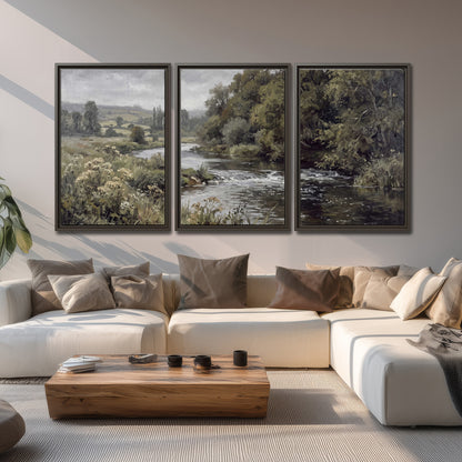 A gently flowing river bordered by olive-green trees and flowers 3 piece framed canvas wall art displayed in a living room