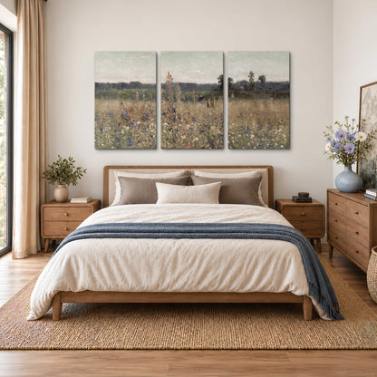 A loose painterly meadow with scattered blue and white wildflowers 3 piece canvas wall art styled in an interior