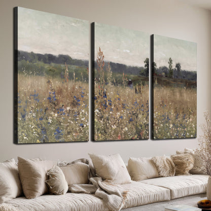 A loose painterly meadow with scattered blue and white wildflowers 3 piece canvas wall art room and product view