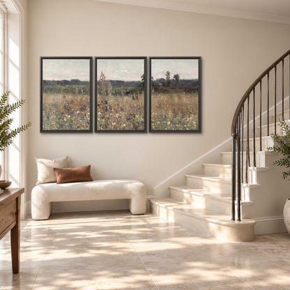A loose painterly meadow with scattered blue and white wildflowers 3 piece framed canvas wall art styled in an interior