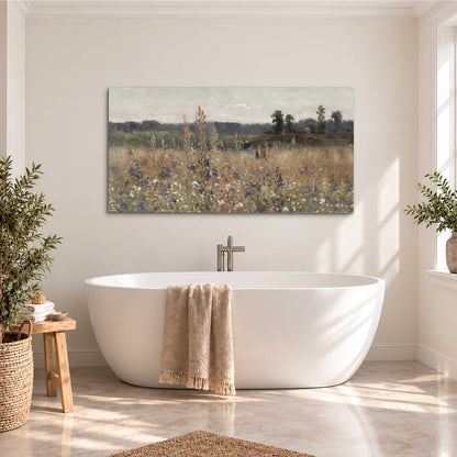 A loose painterly meadow with scattered blue and white wildflowers single canvas wall art styled in an interior