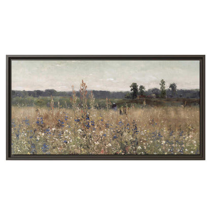 A loose painterly meadow with scattered blue and white wildflowers single framed canvas wall art viewed straight on