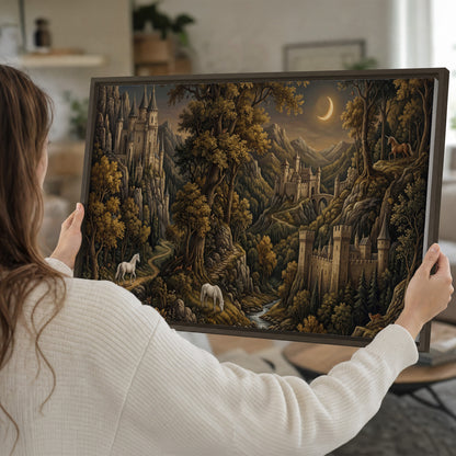 Fantasy castles, white horses and golden trees beneath a crescent moon single framed canvas wall art held in hands